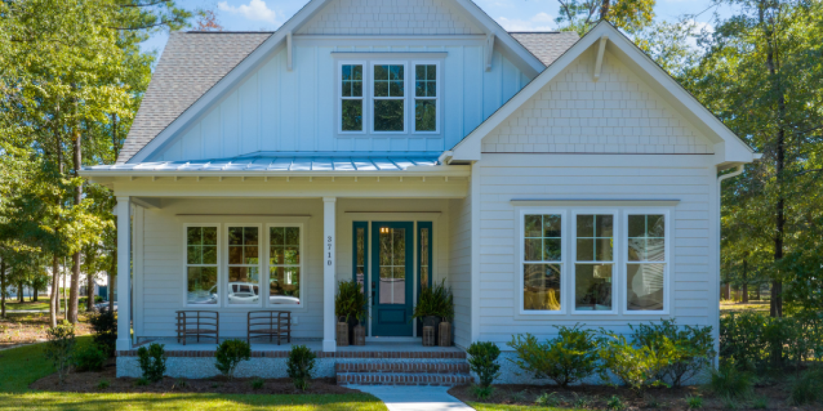 exterior of a home in the River Bluffs community with white siding and front porch