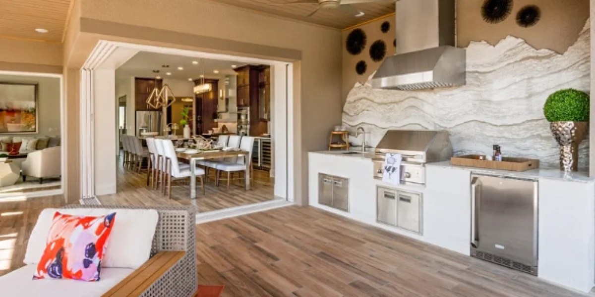 : Outdoor living space with a grill, dining area, and cozy seating, perfect for retirees enjoying al fresco time.